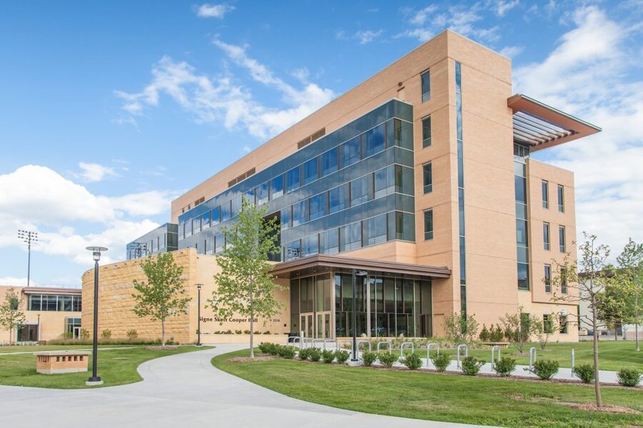 Signe Skott Cooper Hall- building exterior with landscaping. 